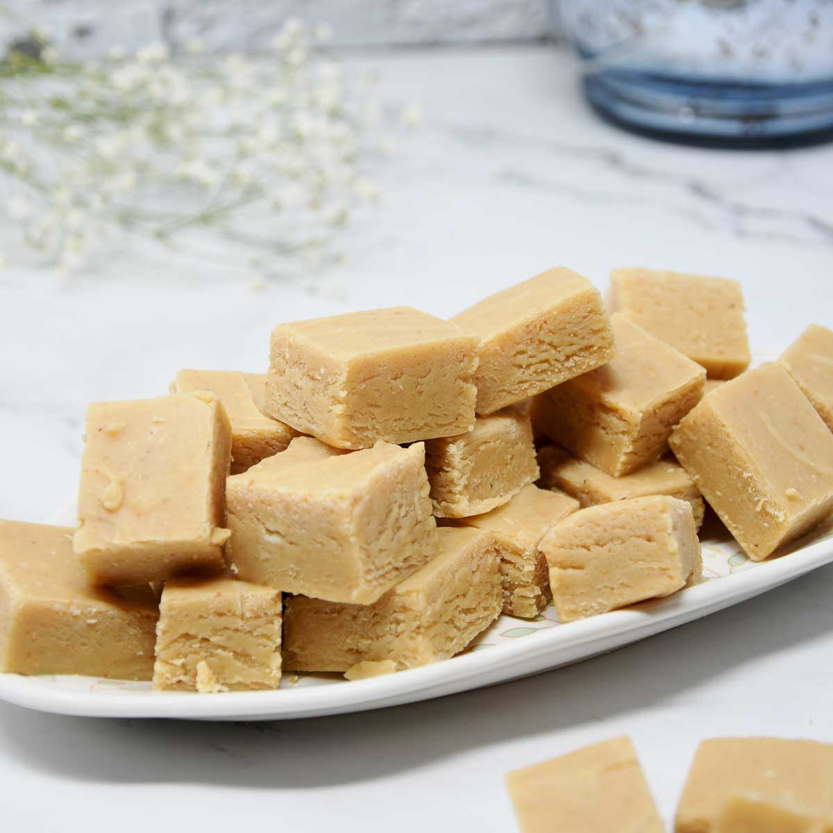 Peanut butter Fudge cubes in a serving plate.