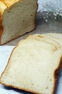 Buttermilk bread loaf and slices.