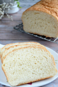 Cottage cheese bread slices on a cheese board.