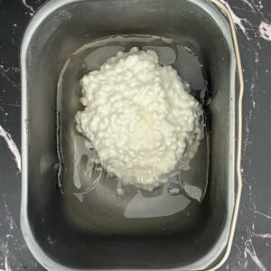 Cottage cheese in bread pan.