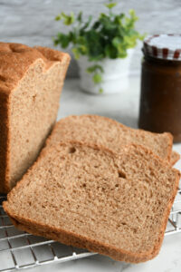 Wheat bread slices on a platter.