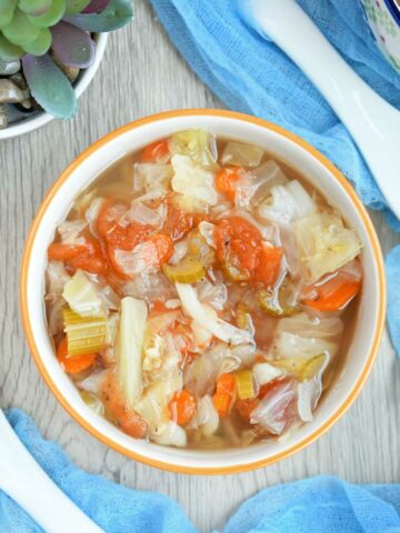 Cabbage soup served in a bowl.