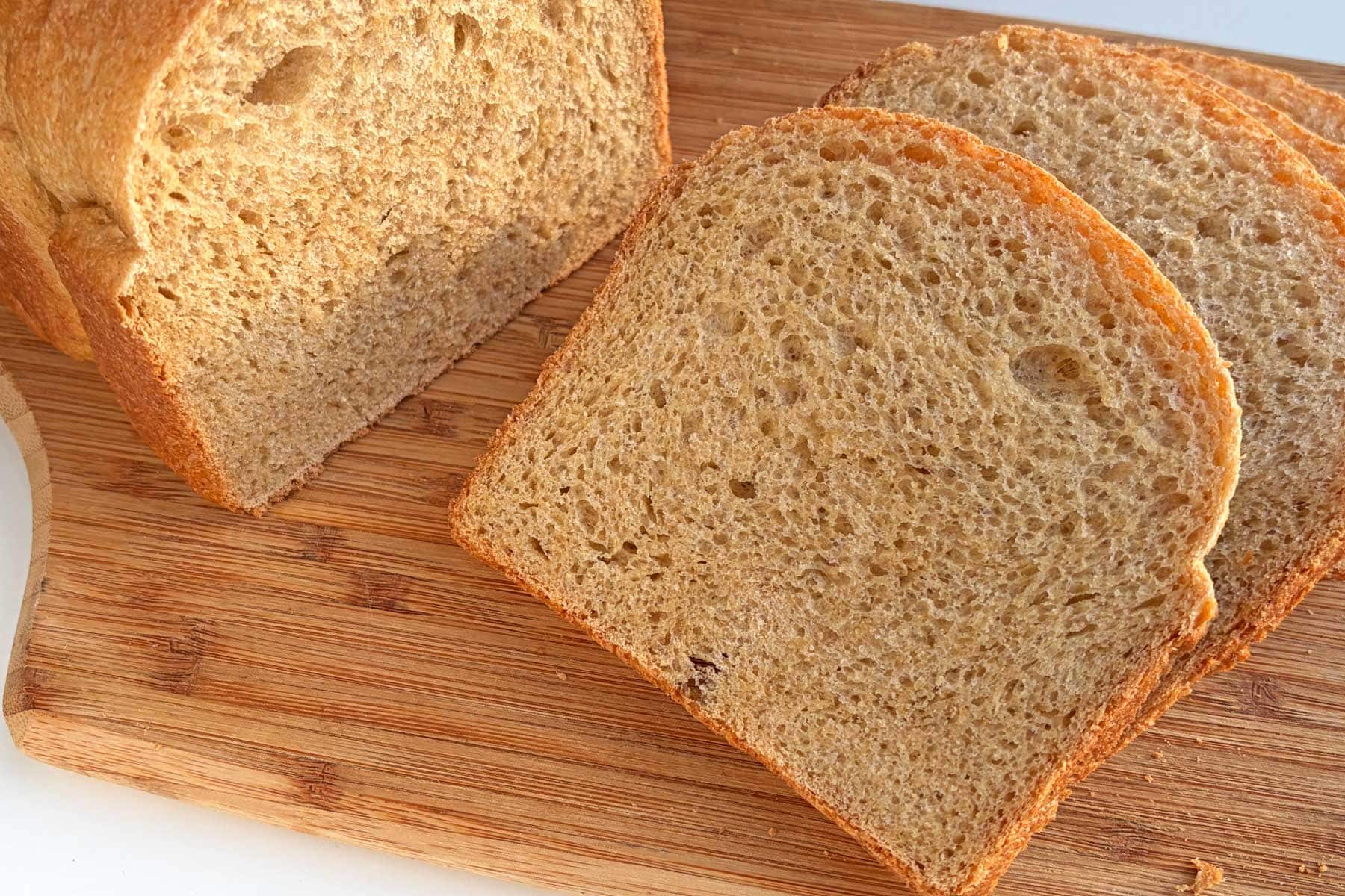 Bread slices on a serving board.