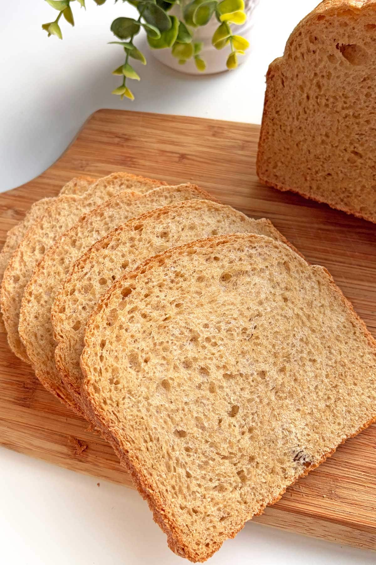 Bread slices on a serving board.