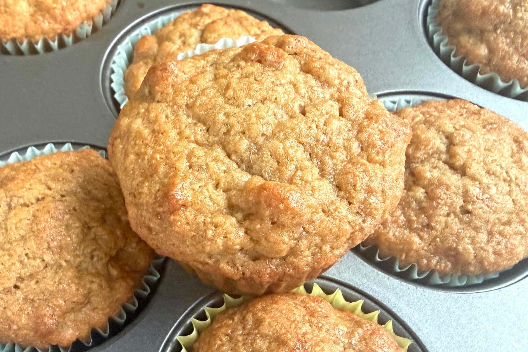 Baked Banana Muffins in a baking tray.