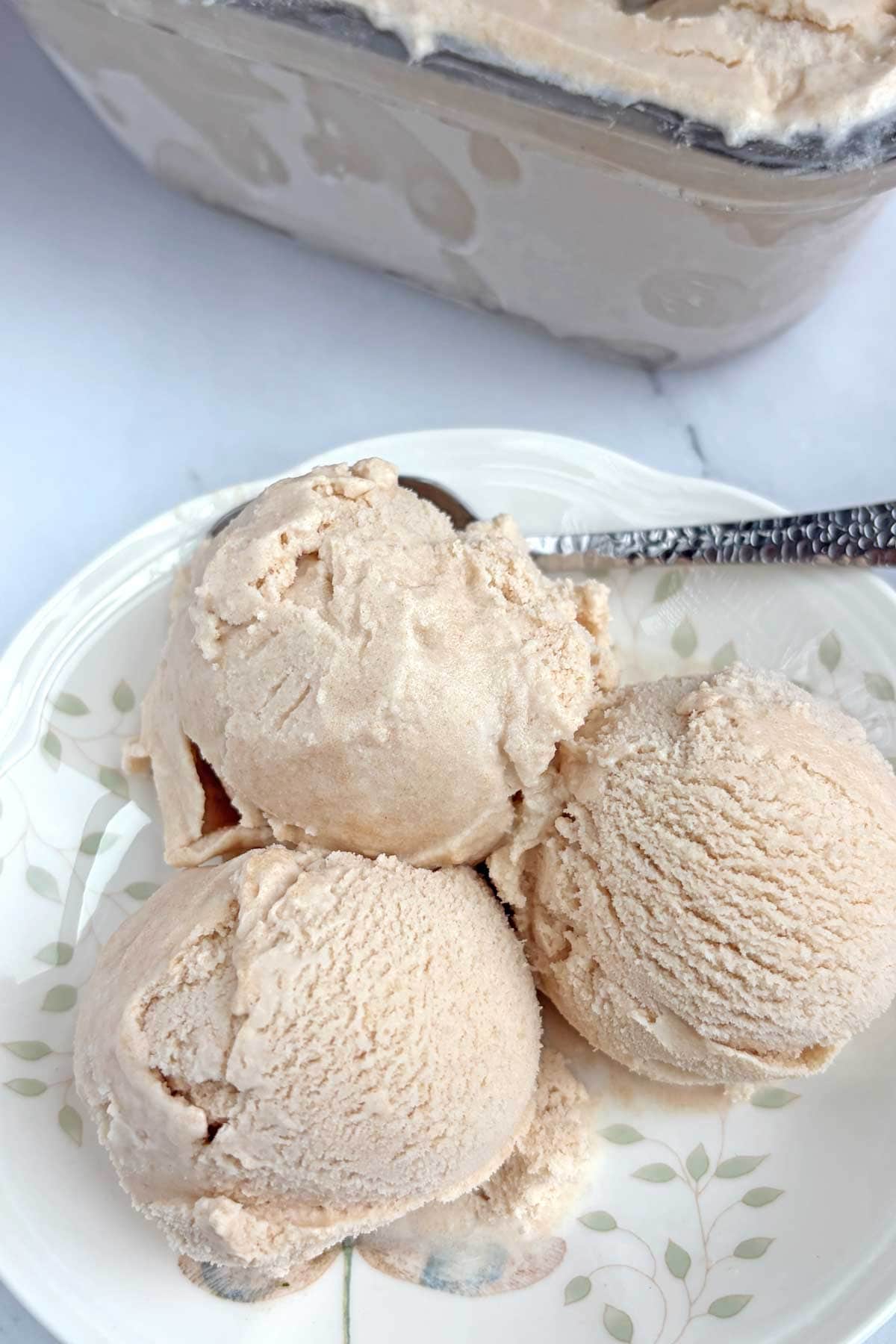Chikoo ice cream scoops in a dessert plate.