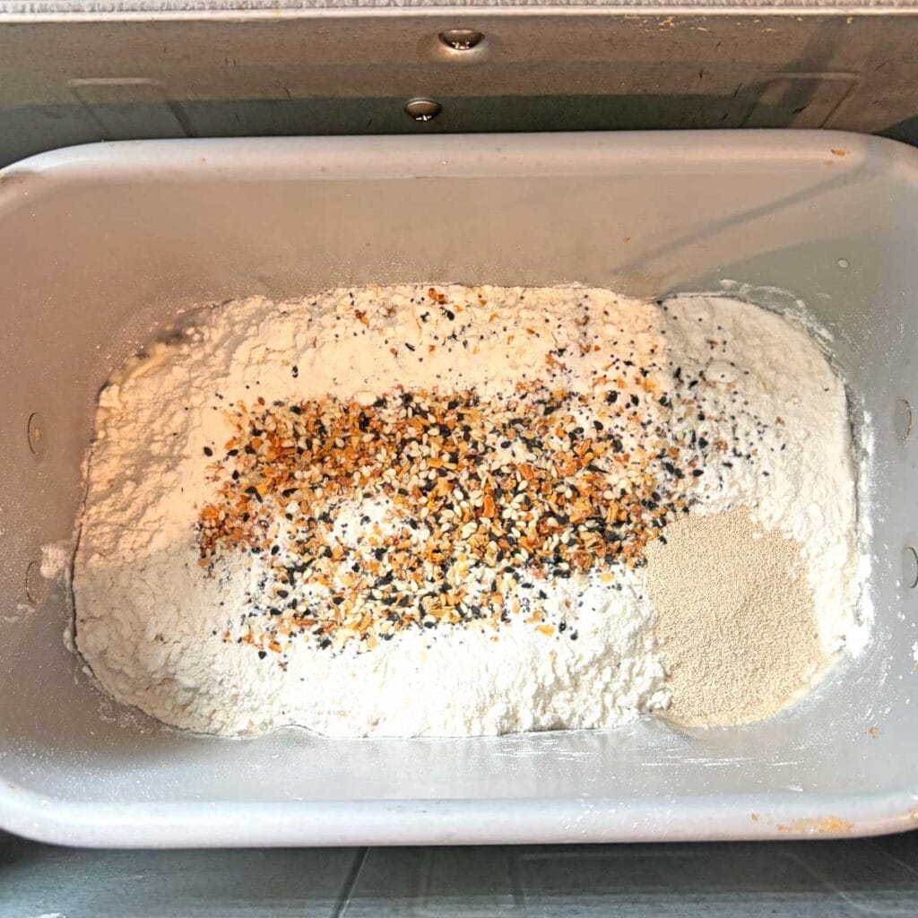 Everything Seasoning bread ingredients in a bread pan.