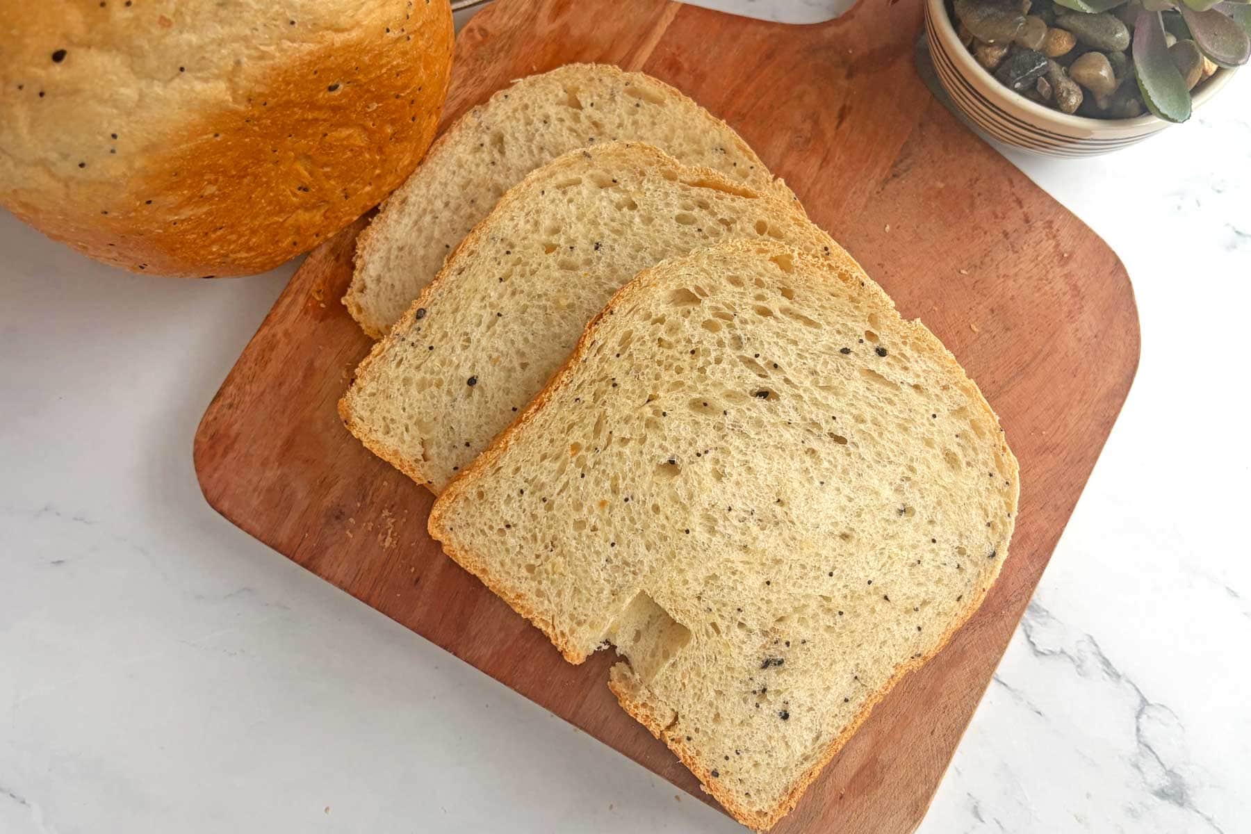 Everything Seasoning bread slices on serving board.