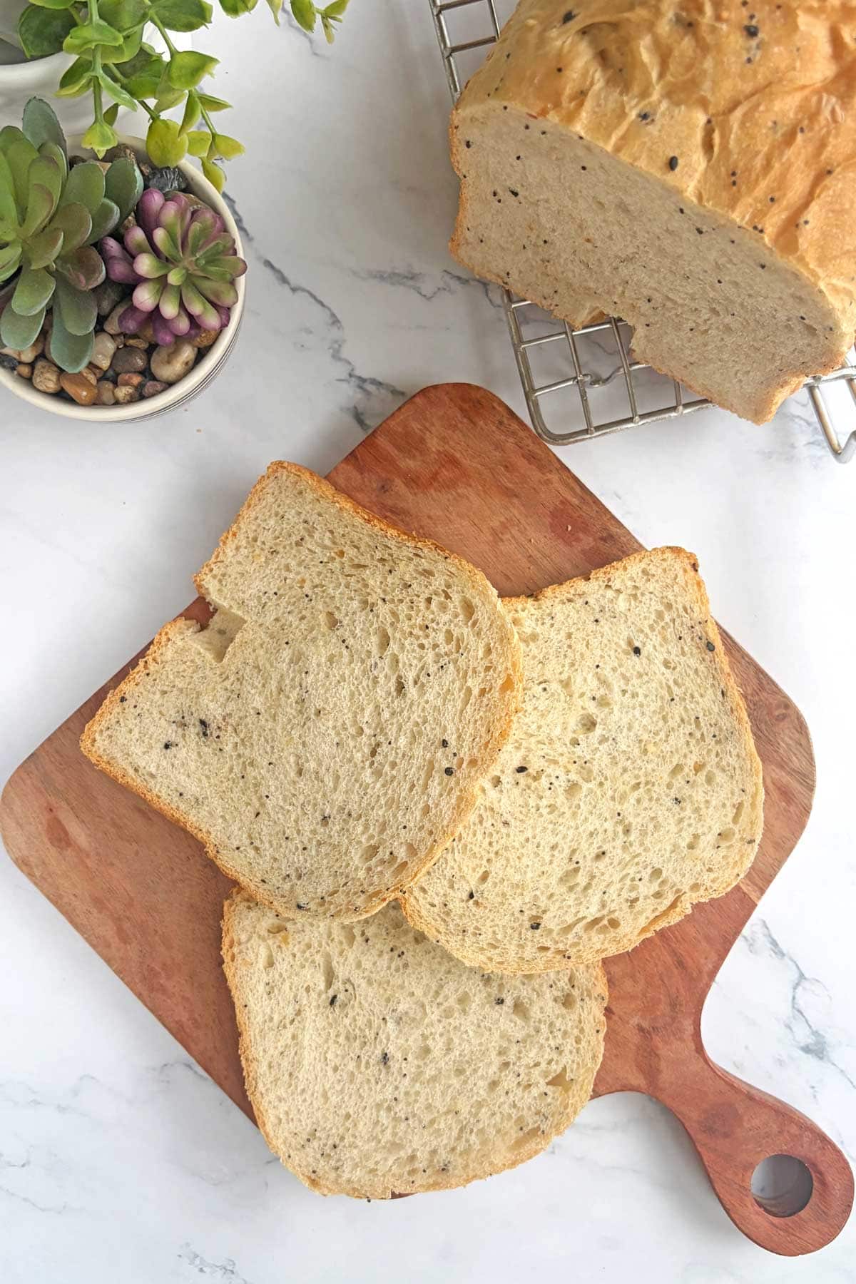 Everything Seasoning bread slices on serving board.